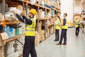 Workers stacking products in a warehouse - Riddle & Brantley