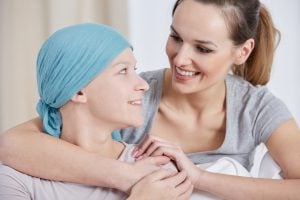 Photo of hopeful cancer woman with friend