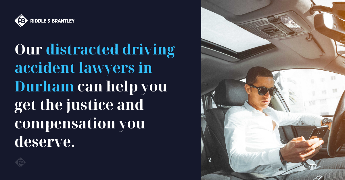 Our distracted driving accident lawyers in Duham can help you get the justice and compensation you deserve. A man is in a vehicle looking at a phone wearing sunglasses.