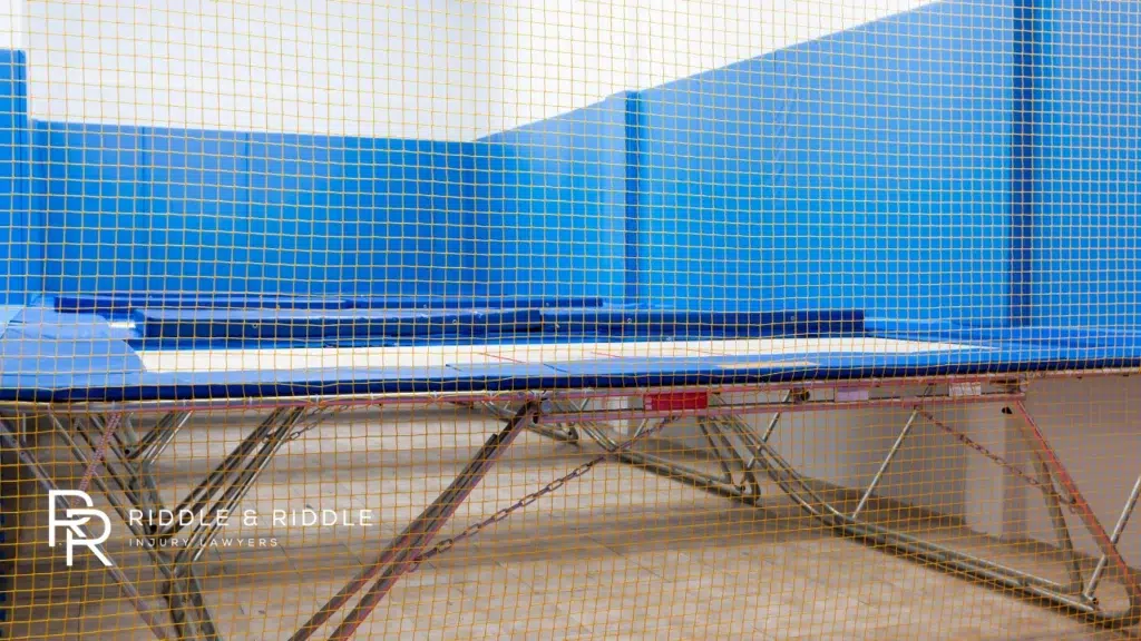 Netted trampoline in a gymnasium