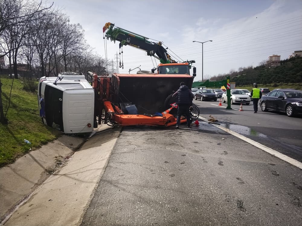 A truck and a vehicle overturned after a collision, showcasing the potential damages in a truck accident claim.