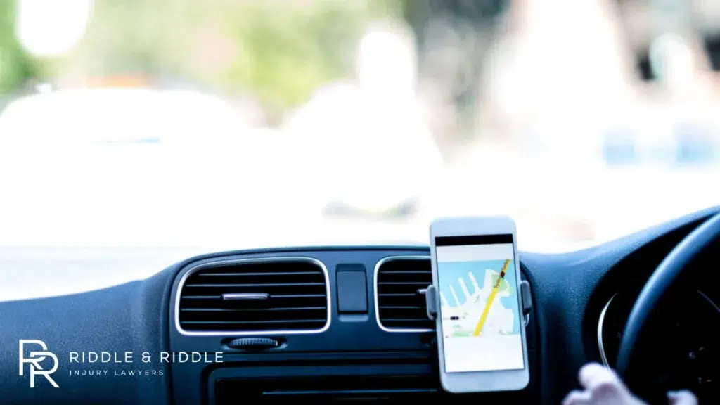 phone being displayed on the dash board