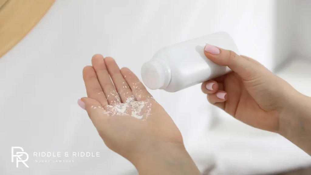 The image shows a woman applying talcum powder