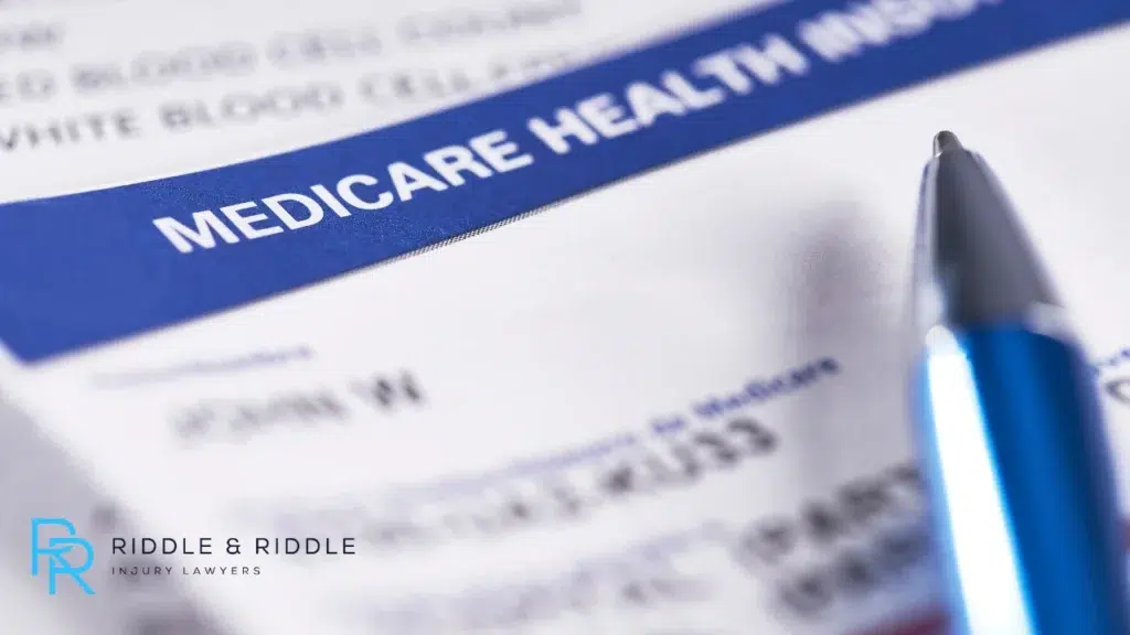 Medicare health insurance document with pen