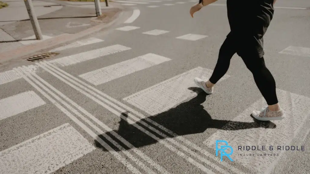 Person crossing the crosswalk close up angle