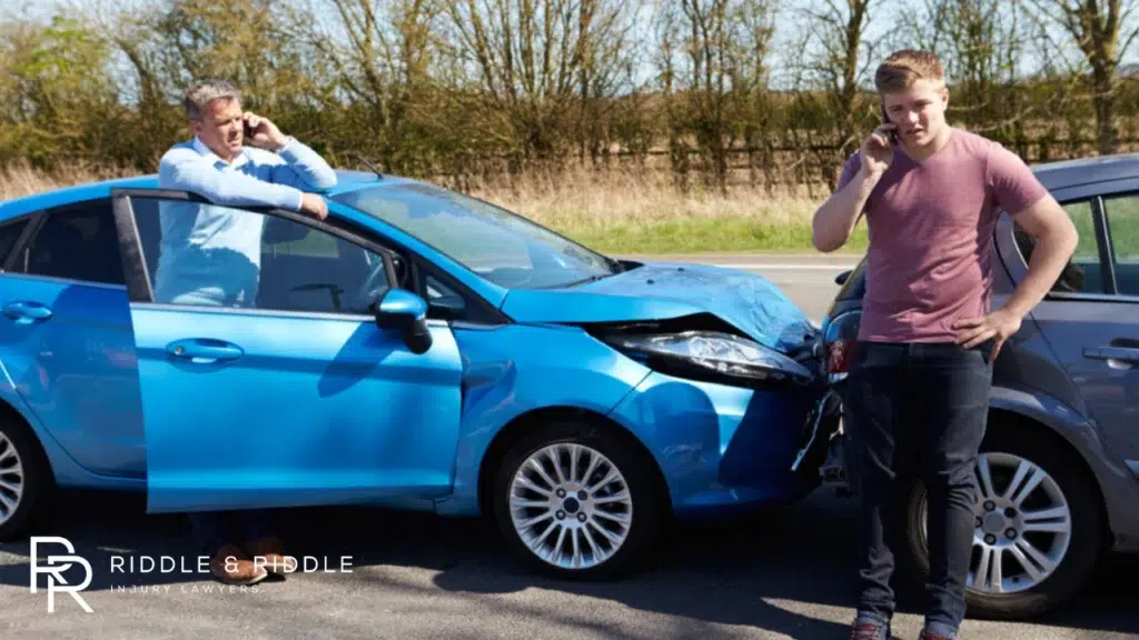 two men involved in a car accident