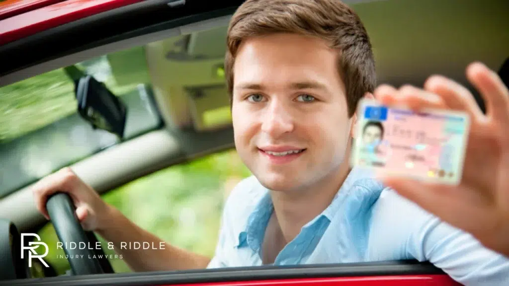A man showing his driver's license