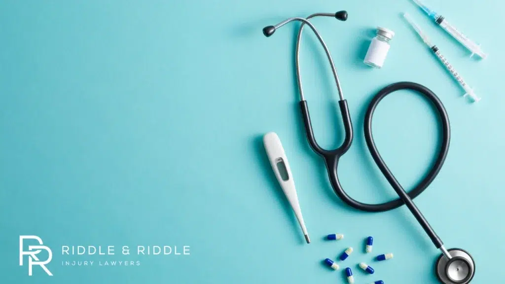 Stethoscope, thermometer, and pills